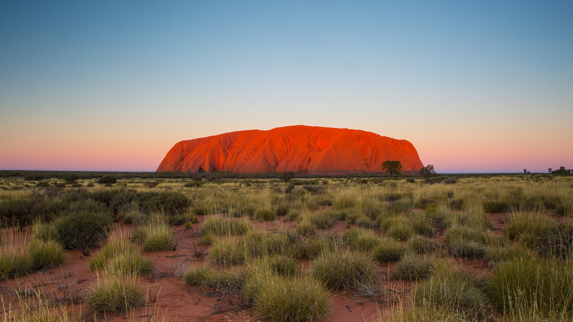 In Northern Territory spot the beautiful Uluru at dusk.