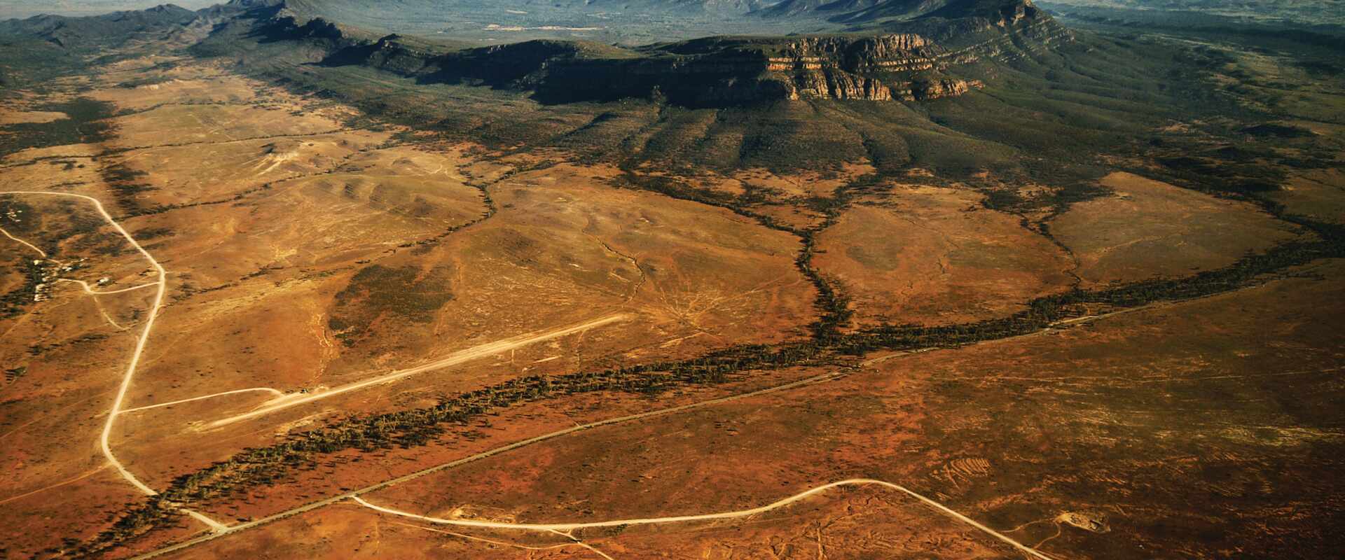 Aerial view across a wide open barren landscape, South Australia