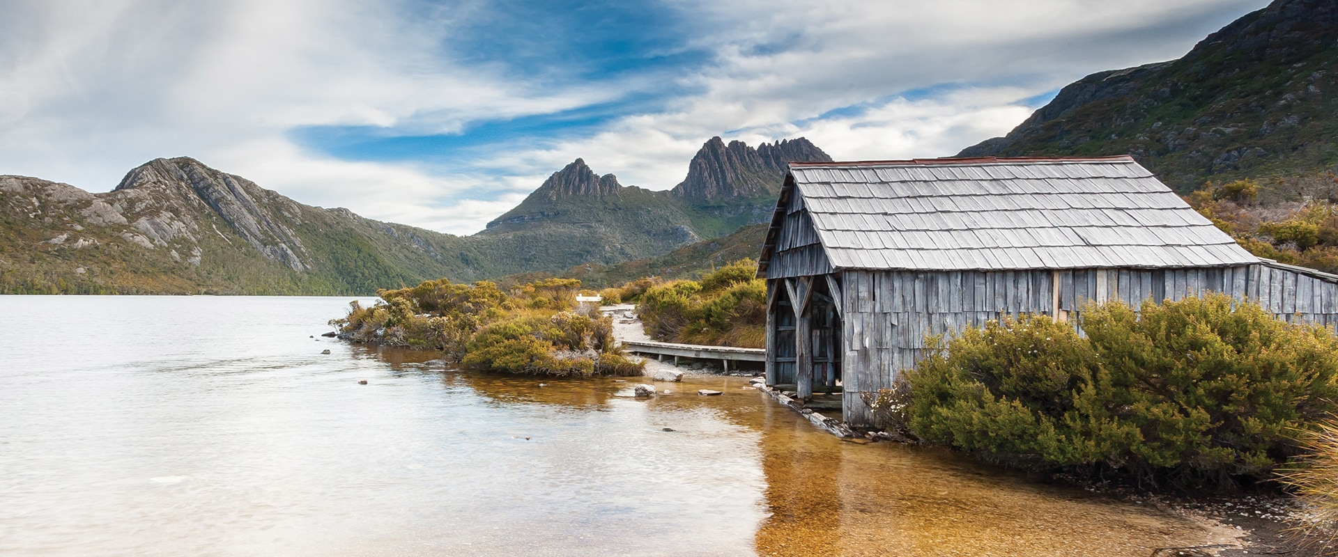 A remote wilderness area with lake and small timber shed, Tasmania