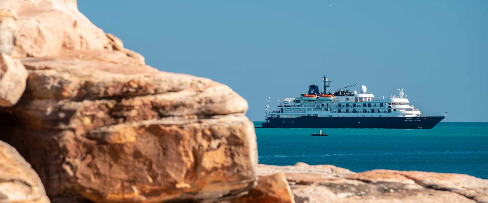 Small ship MS Caledonian Sky off the coast of Biggie Island, Western Australia