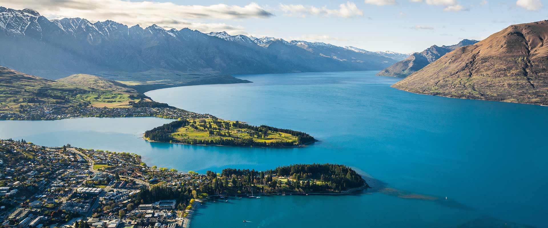 View across the lake surrounding Queenstown, New Zealand