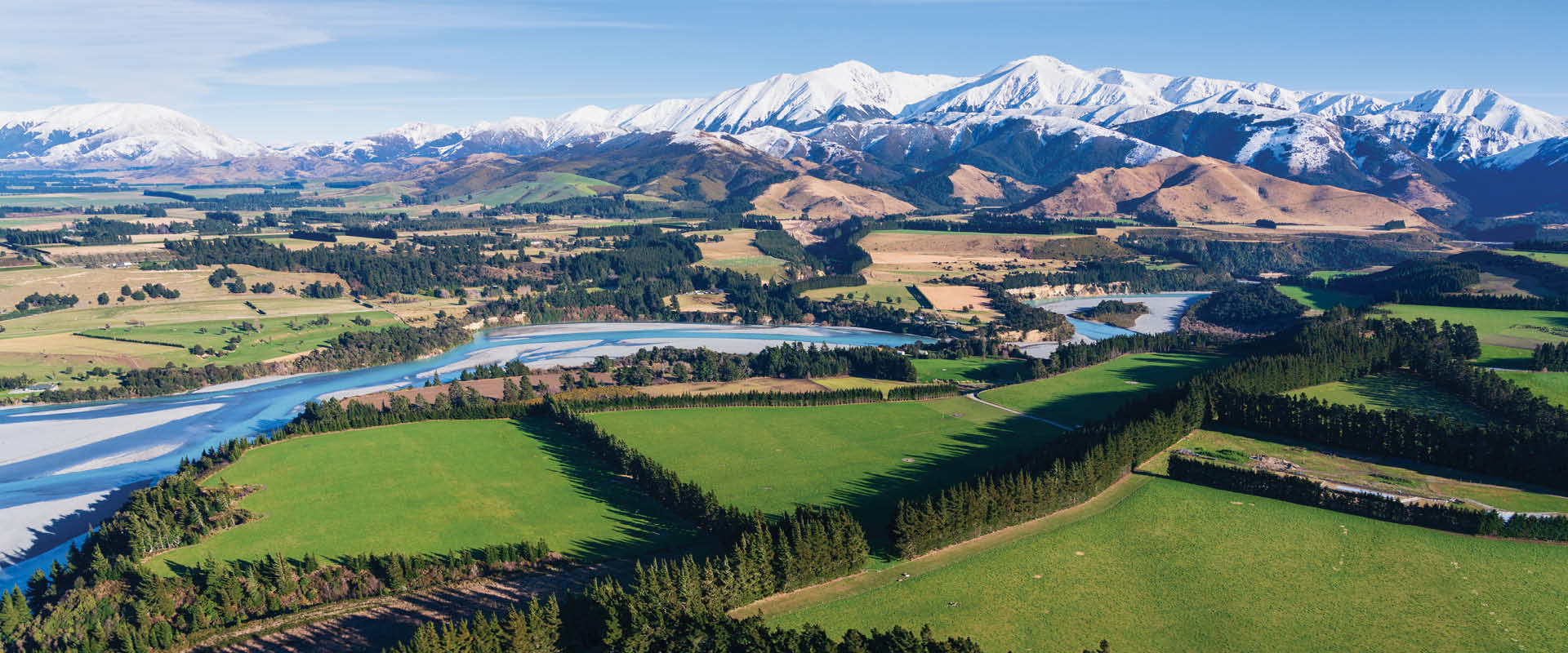 Aerial view of the snow capped Southern Alps and Waimakariri River