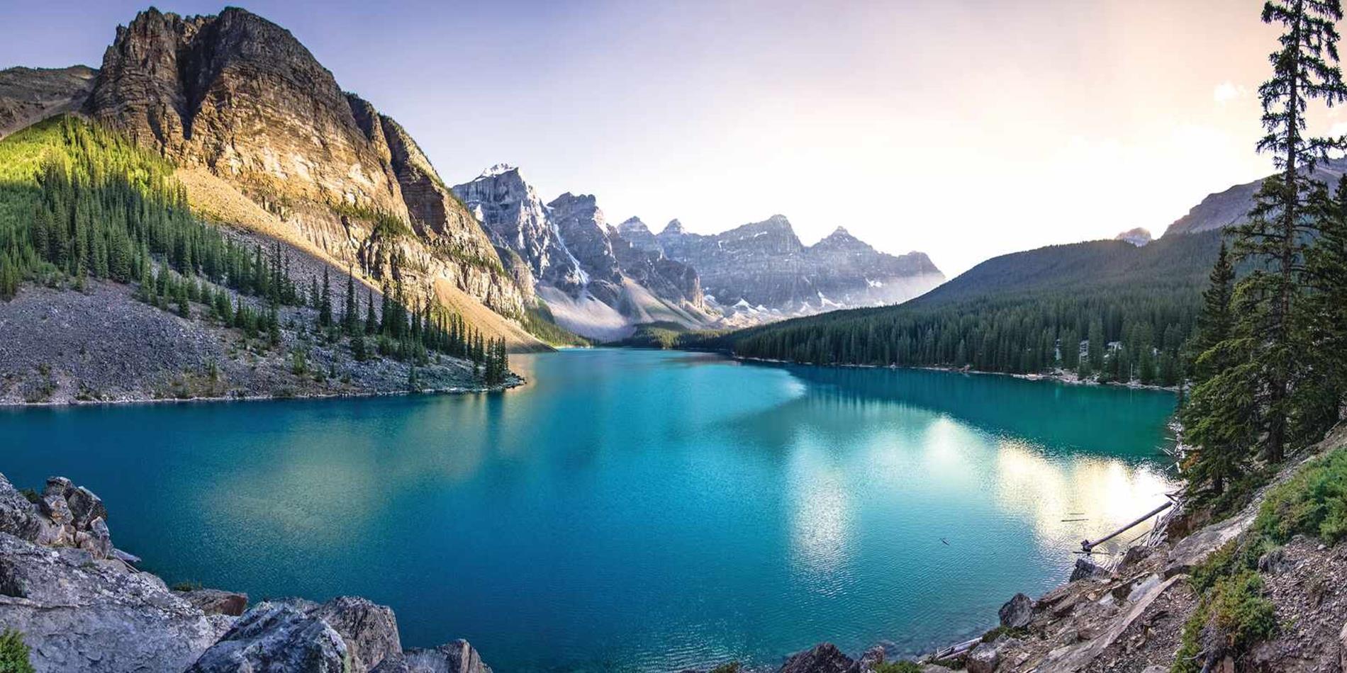 View of blue lake surrounded by mountains, Canada