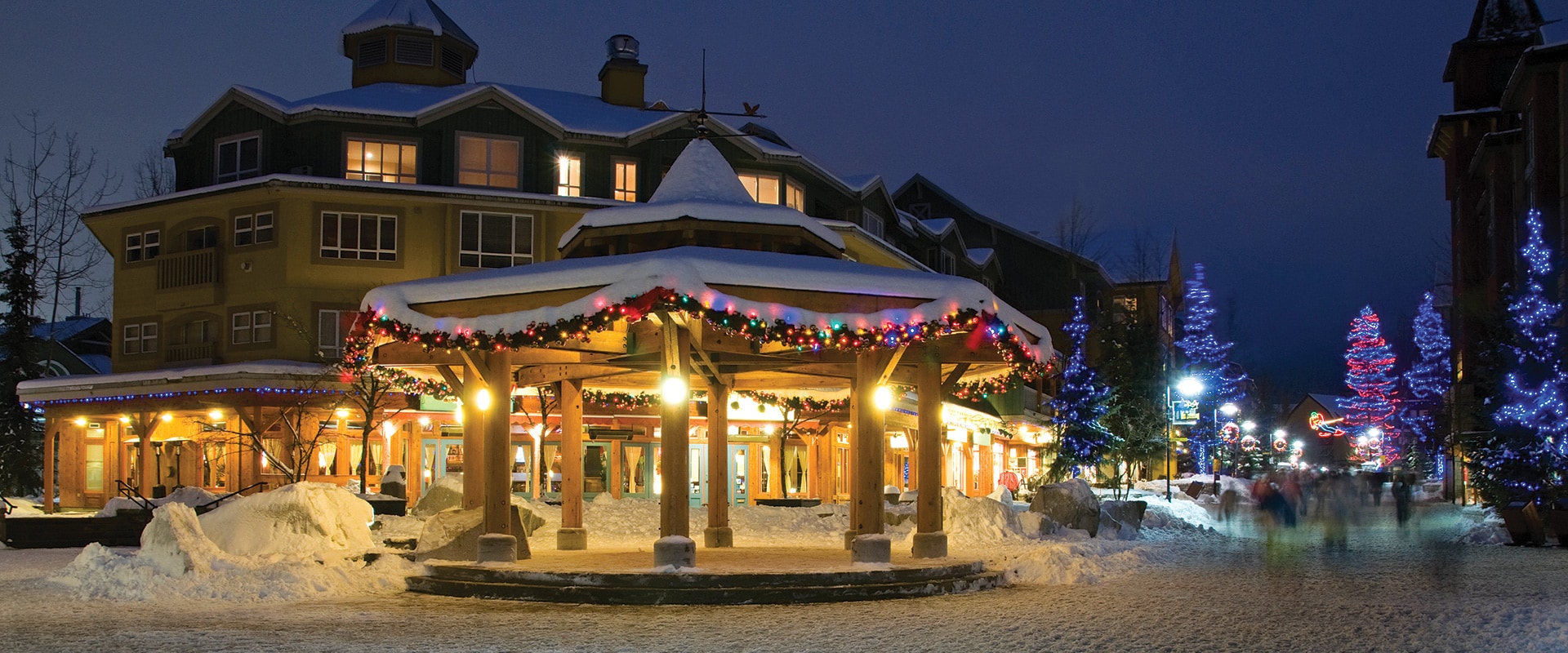 Alpine village lit up at night for Christmas, Whistler