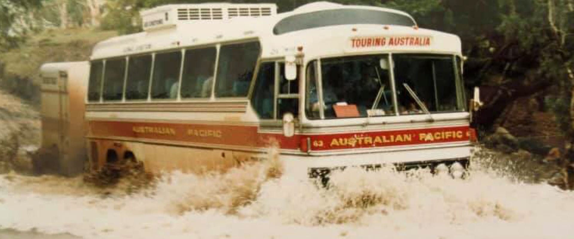 historical apt bus fording river australia