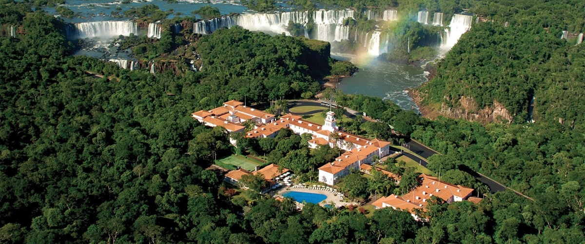 Aerial View of Belmond das Cataratas and Iguazu Falls in background, Argentina