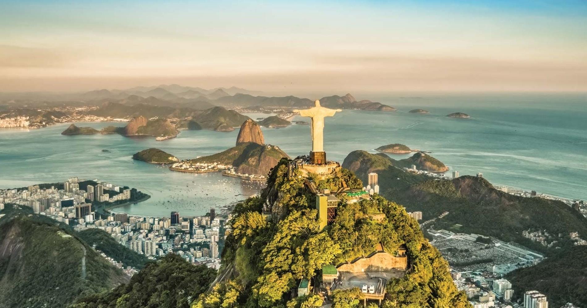View of christ the redeemer overlooking city and coastline, Brazil