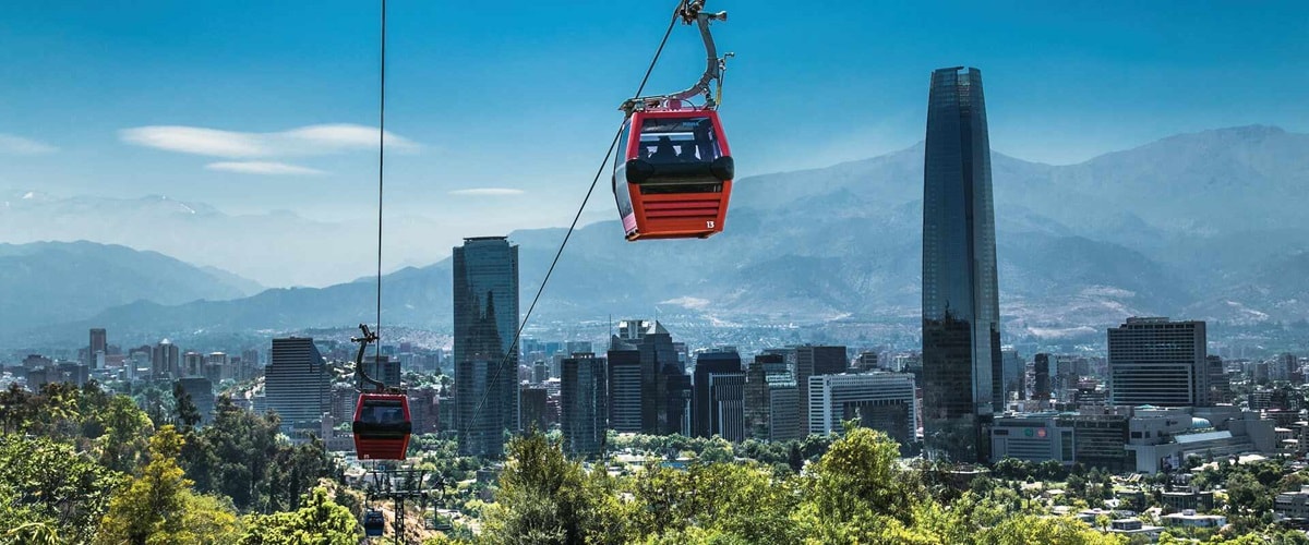 Take in panoramic views of the vibrant city of Santiago, Chile by cable car