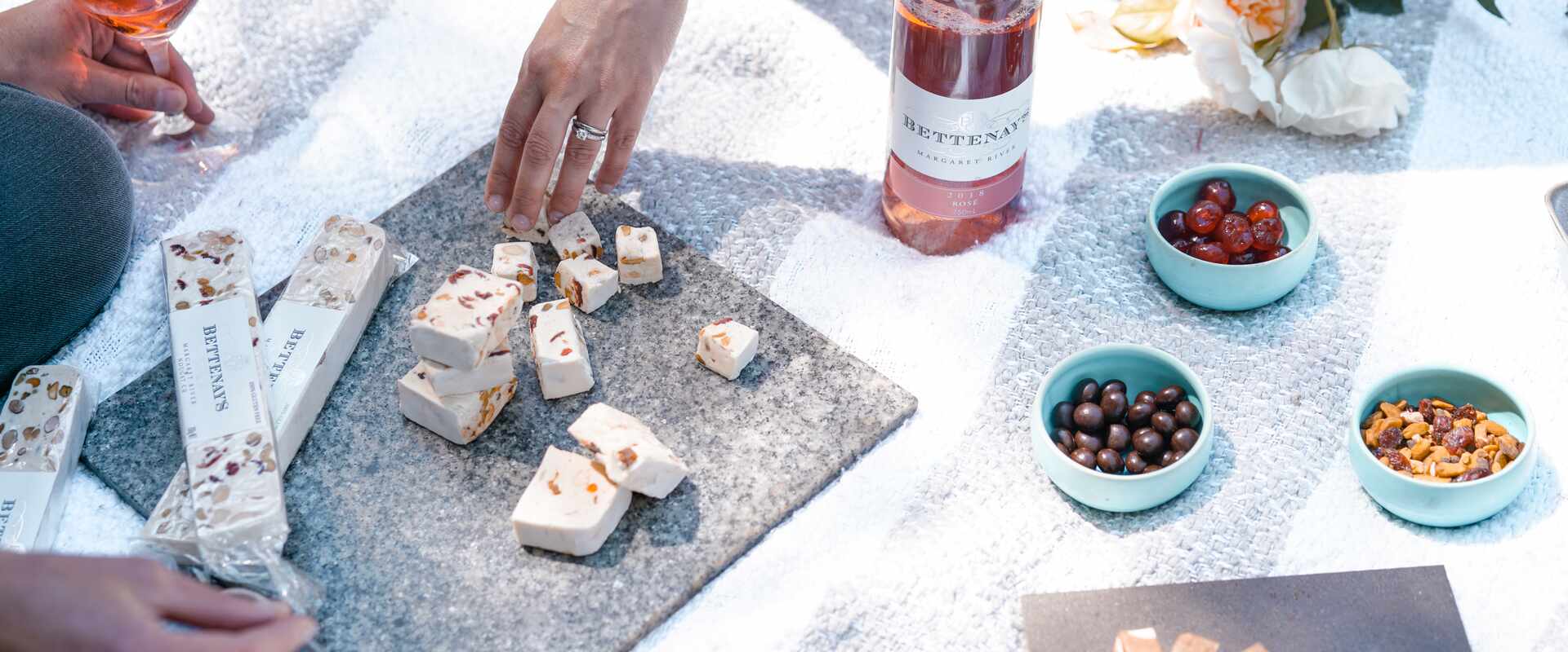 margaret river nougat company outdoor setting with bettenay nougat and wine