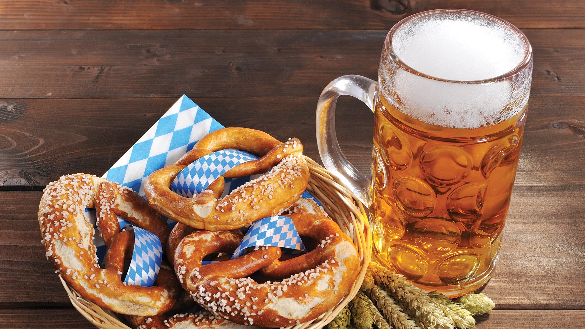 Stein glass of beer and a plate of pretsels, Germany