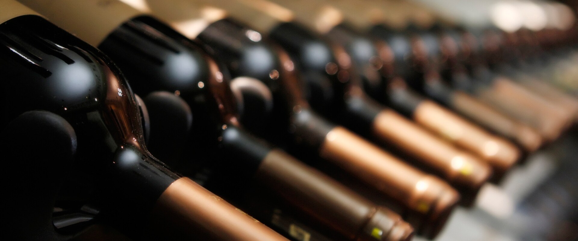 Row of wine bottles lying down