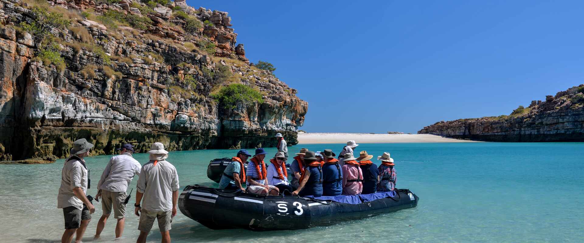 passengers zodiac expedition bigge island kimberley coast, australia